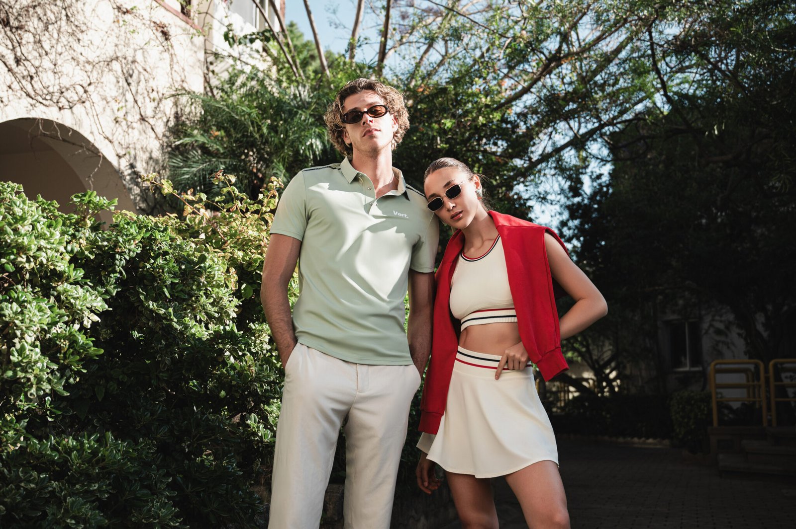 Men and women wearing luxury tennis and padel clothes in country club
